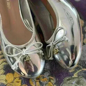 Super cuter ballet shoes with a small heel. Recycled button charm Size 8